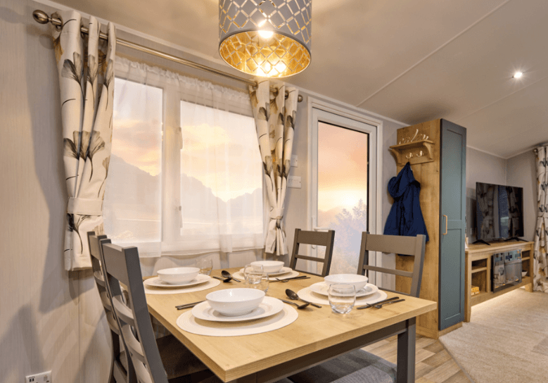 See the 2026 Green Willerby Sierra at Ideal Caravans Langley Moor. 38x12 stylish holiday home with open-plan living, king-size bed, and modern design. Large Image 1