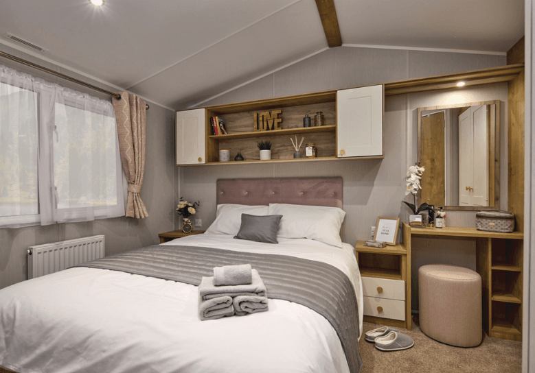 See the 2026 Green Willerby Sierra at Ideal Caravans Langley Moor. 38x12 stylish holiday home with open-plan living, king-size bed, and modern design. Large Image 3